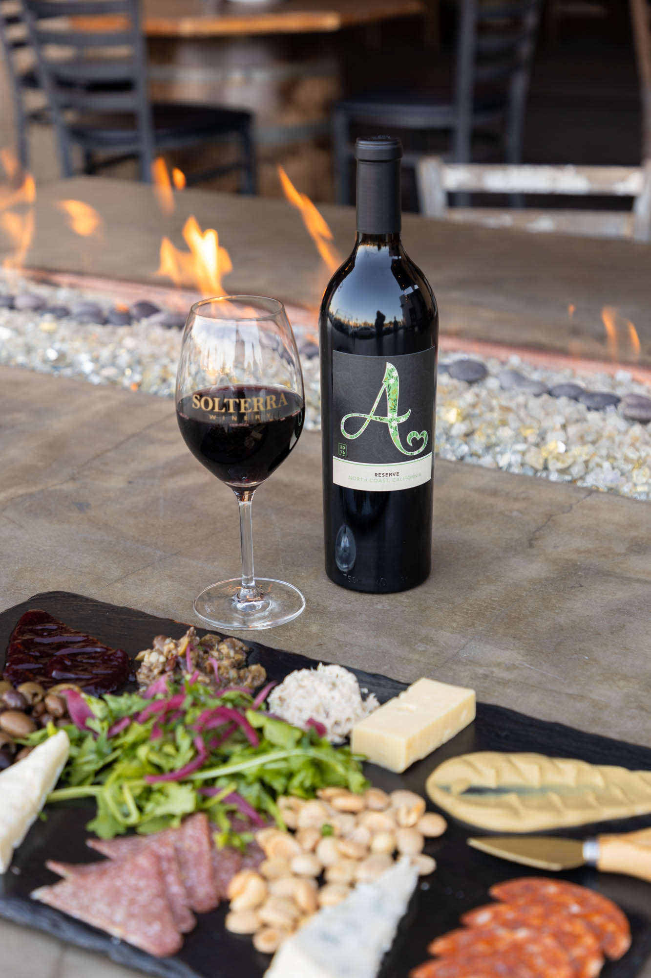 Meat and cheese platter, and red wine