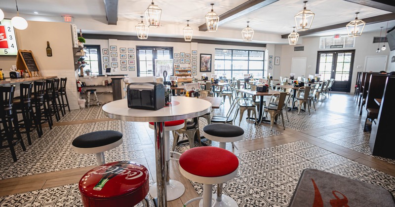 Interior, dining area set for guests