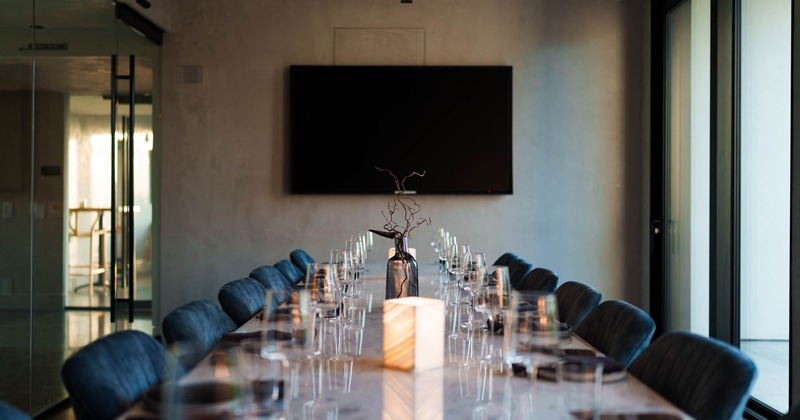 Interior, tables ready, TV on the wall