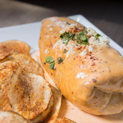 Breakfast Burrito with potato chips.