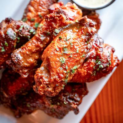 Chipotle Citrus Wings served with peppercorn ranch.