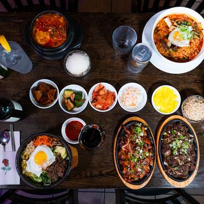 Assortment of dishes and drinks, top view.
