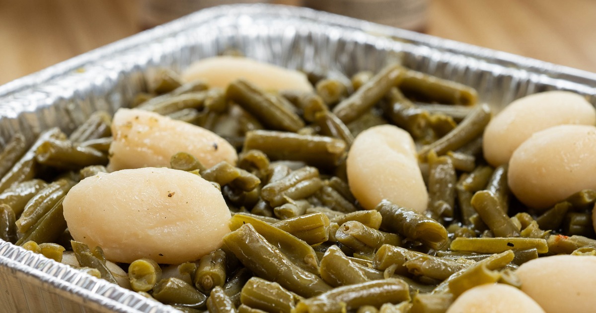 Green Bean and Potato Mix served in a foil catering tray