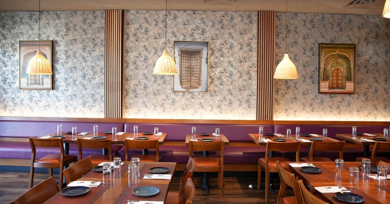 Interior, set tables and chairs ready for guests