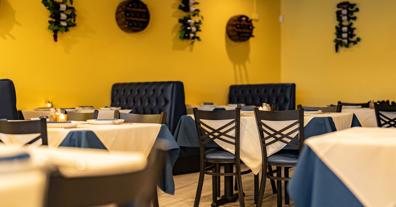 Diner area, tables and chairs, booths behind