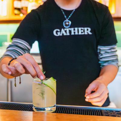 A person preparing a drink.