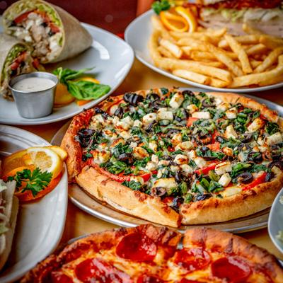 Various pizzas and other food.