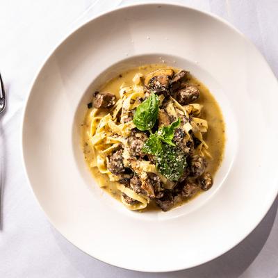 Linguine, with mushrooms and sauce.