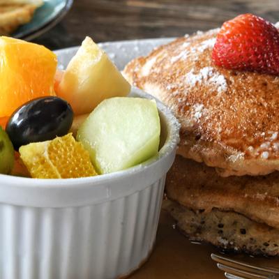 Pancakes and fresh fruit.
