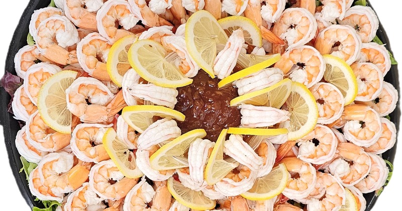 Large shrimp cocktail platter isolated on a the white background