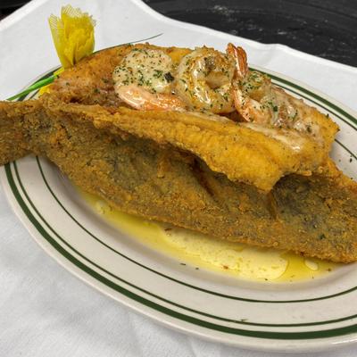 Whole Fried Flounder with Shrimp Beurre Blanc.