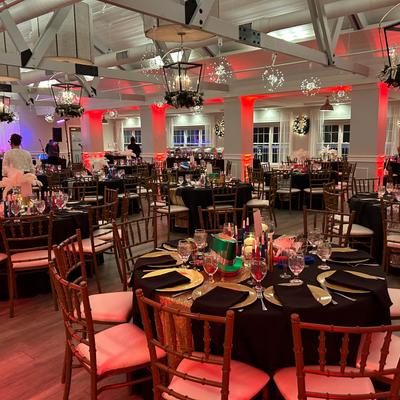 Banquet hall with red accent lighting.