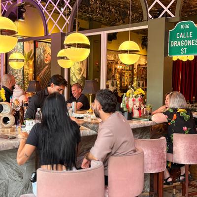 People seated at the bar.