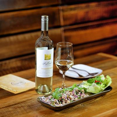 Thai Larb Lettuce Wrap served with white wine.