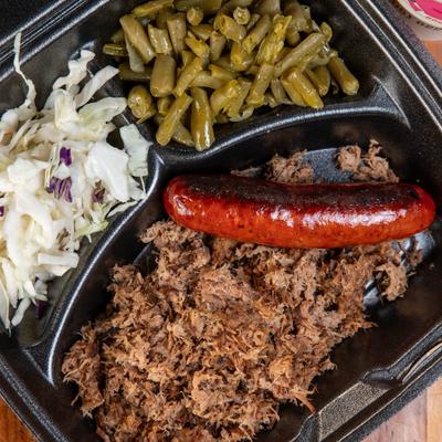 Shredded brisket, sausage, cabbage, and green beans.