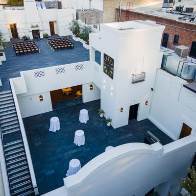 A far shot of the exterior patio.