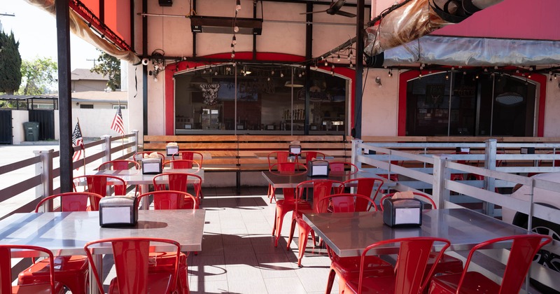 Exterior seating area with chairs and tables
