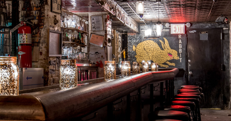Bar and rabbit mural in the background