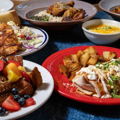 Assortment of dishes displayed on a table, close up.