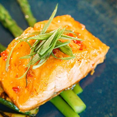 Seared salmon fillet, with herbs, and asparagus.