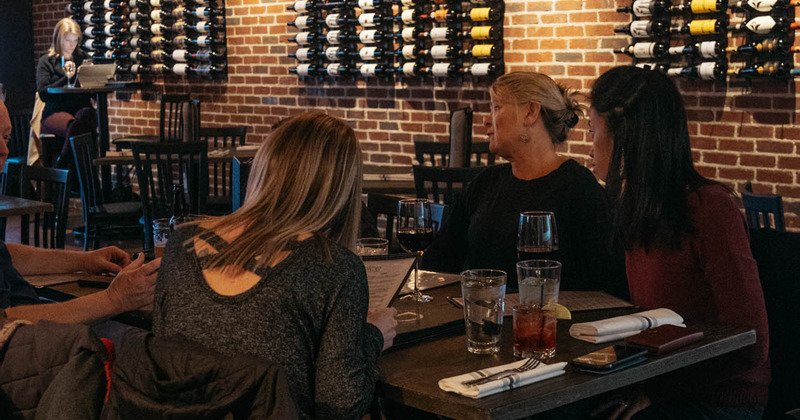 Interior, guests enjoying their drinks