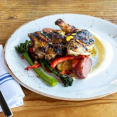 Grilled Moroccan Spiced Boneless Half Chicken dish.