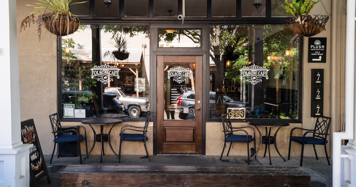 Outdoor seating area in front of the entrance