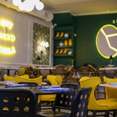 Tables and chairs in a dining area.