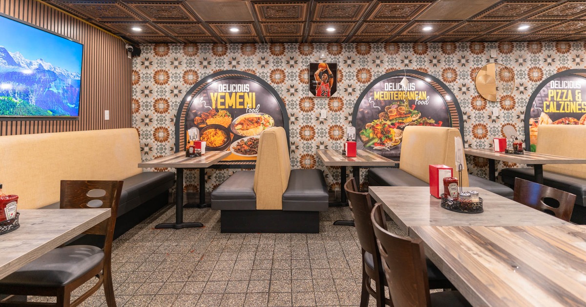 Interior, seating are with booths, tables and chairs