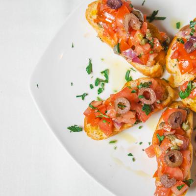 Served bruschetta on the plate.
