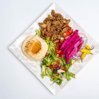 Chicken Shawarma, with hummus, salad, and pickled veggies.