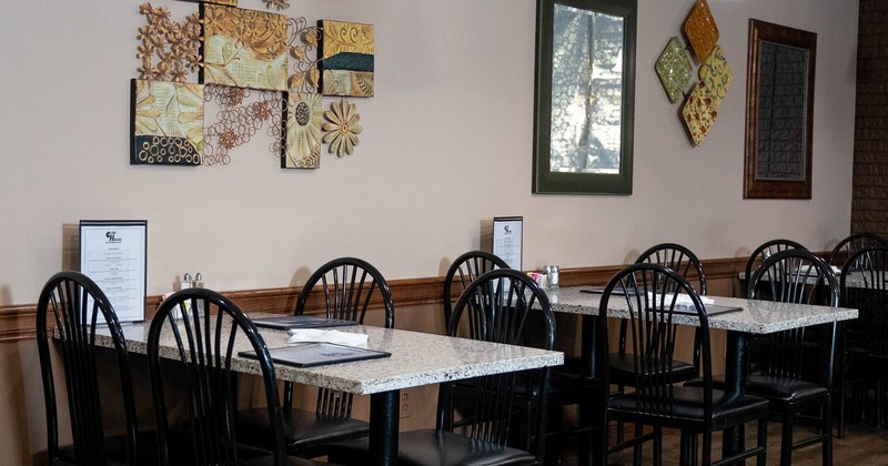 Interior, tables and chairs ready for guests