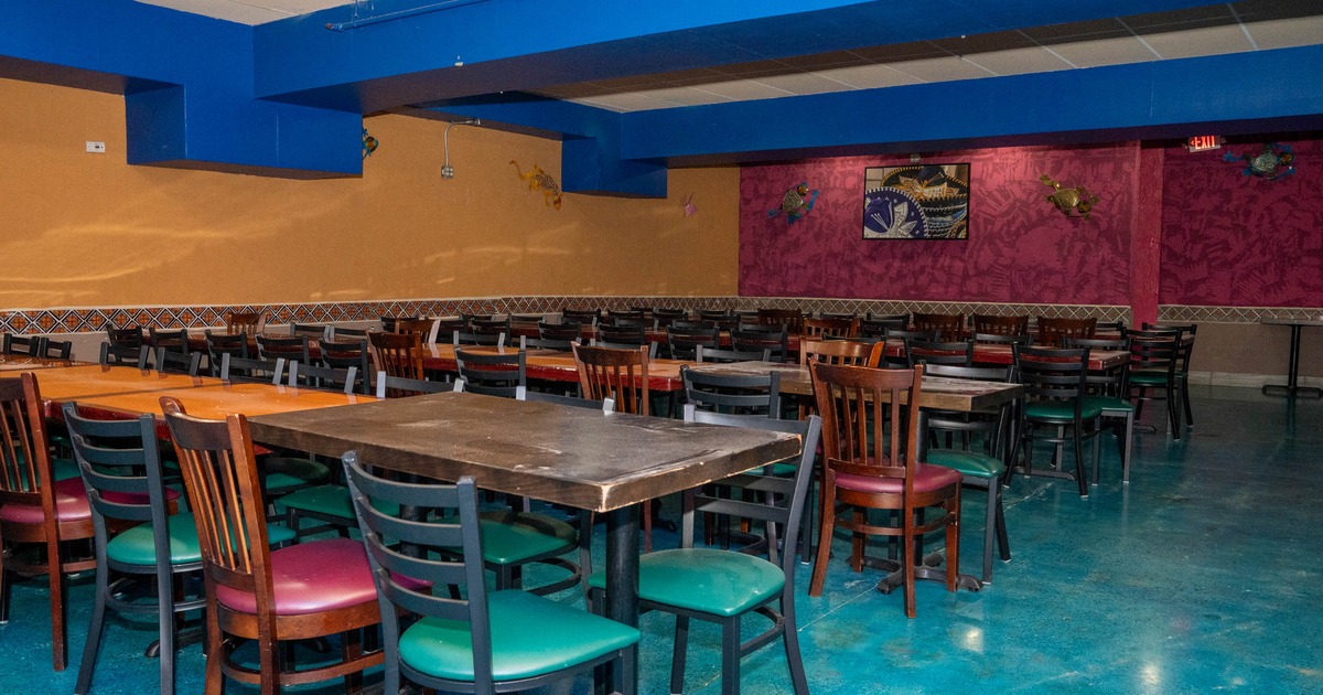 Interior, tables and chairs ready for guests