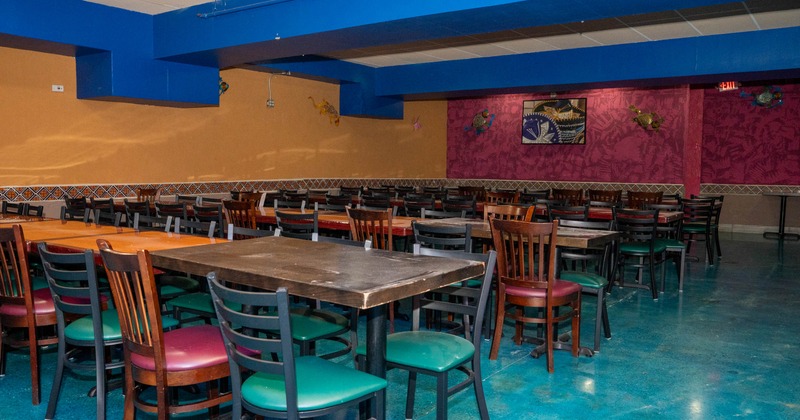 Interior, tables and chairs ready for guests