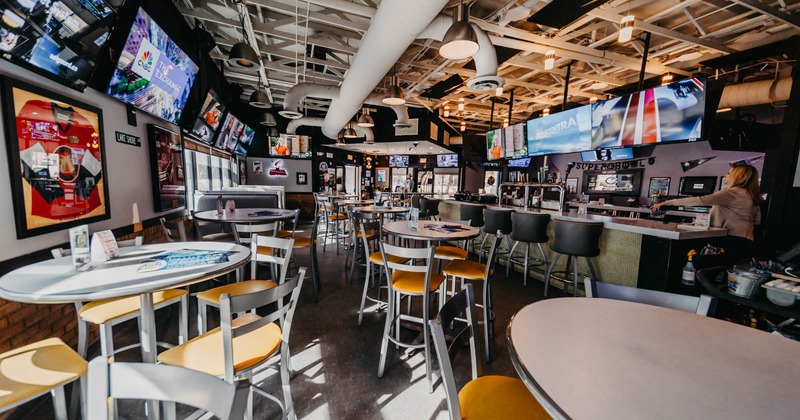Interior, dining area, bar on the right