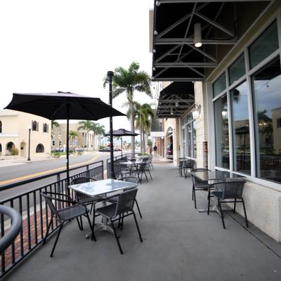 Exterior, tables and chairs ready for guests.
