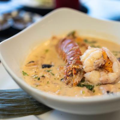 Pan broiled shrimp, fish, octopus and lobster in coconut stew.