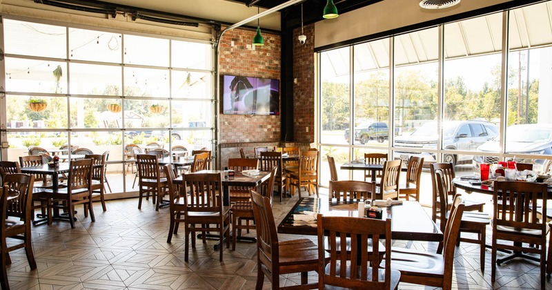 Interior, seating area with tables and chairs