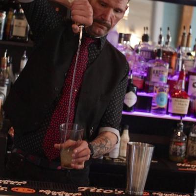 Bartender pouring a drink.
