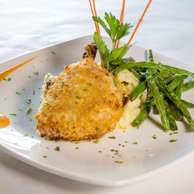 Panko crusted pork chop, with mashed potatoes, and asparagus.