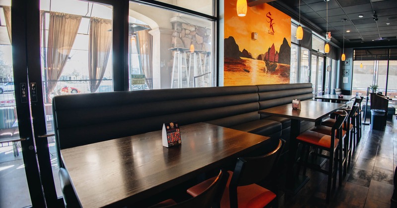 Dining area, long booth, tables and chairs