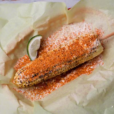 Elote with tajin seasoning