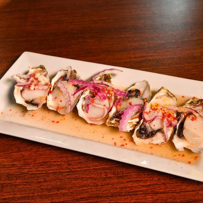 Raw oysters and scallops.