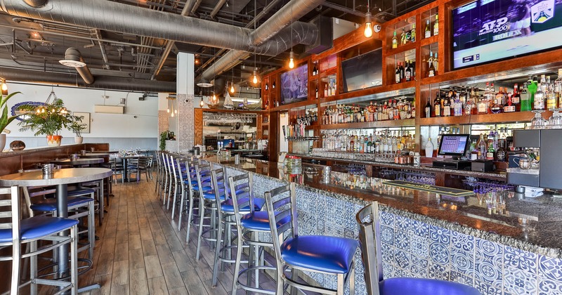 Interior, bar area, high bar tables and bar stools