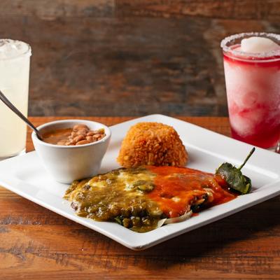 Stuffed and smothered poblano pepper.