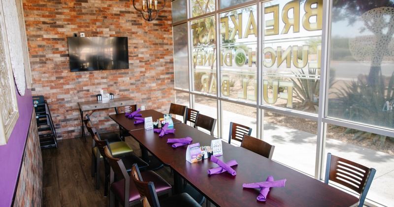 Interior, tables and chairs ready for guests