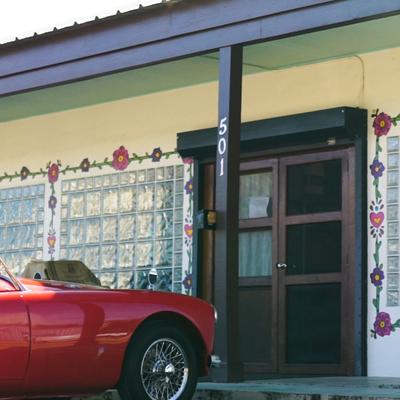 Car in store front.
