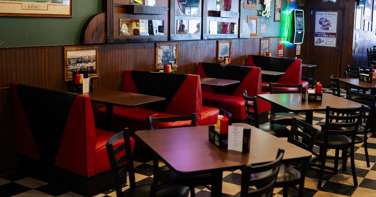 Interior, diner area, red booth, tables, chairs