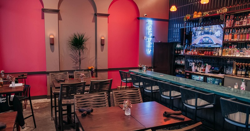 Interior, bar counter area and table and chairs on the left