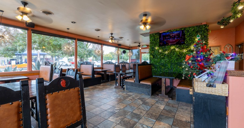Interior seating area with double booths, tables and chairs